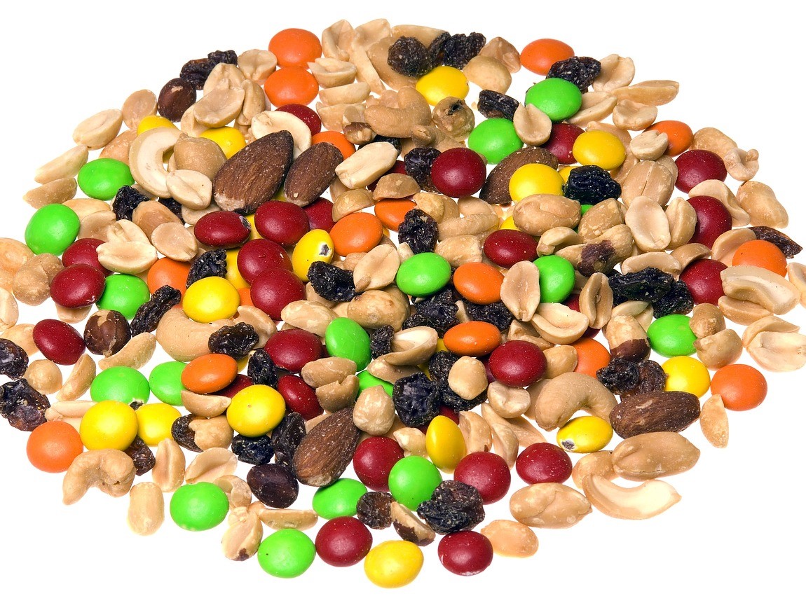 Trail mix with mixed nuts, raisins, and chocolate covered candies